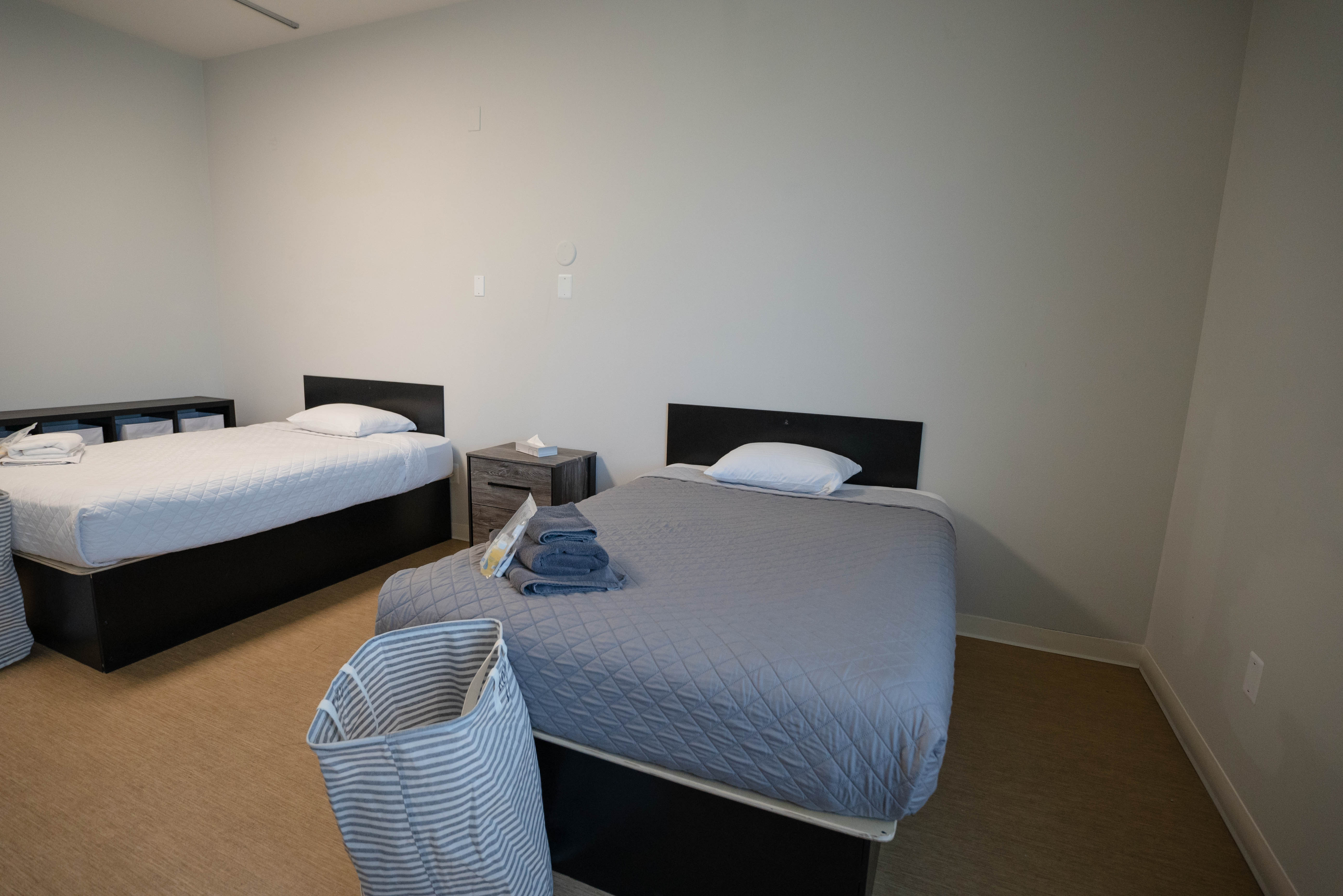 Silver State bedroom with twin beds and welcome amenities