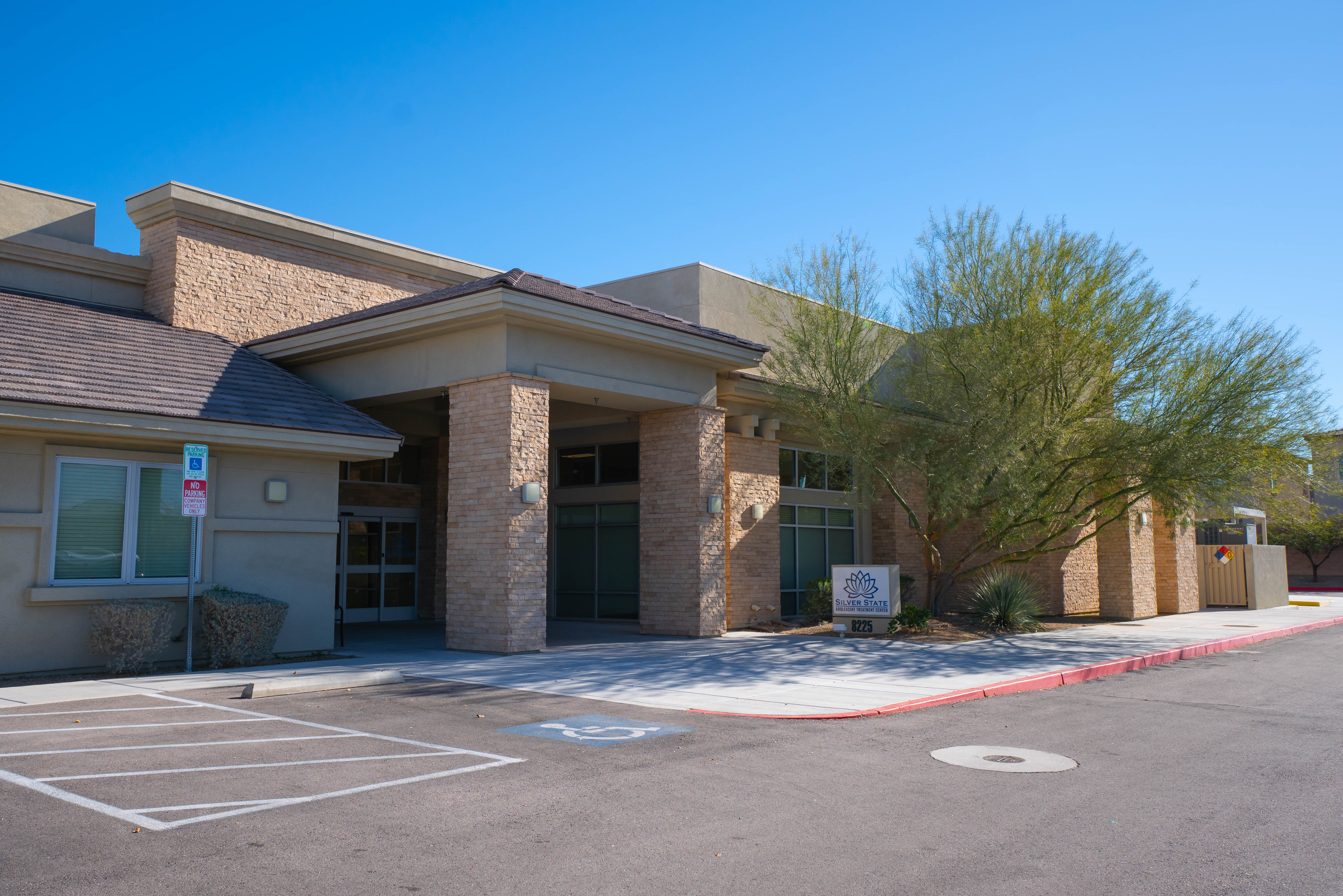 Silver State building angled view with stone facade