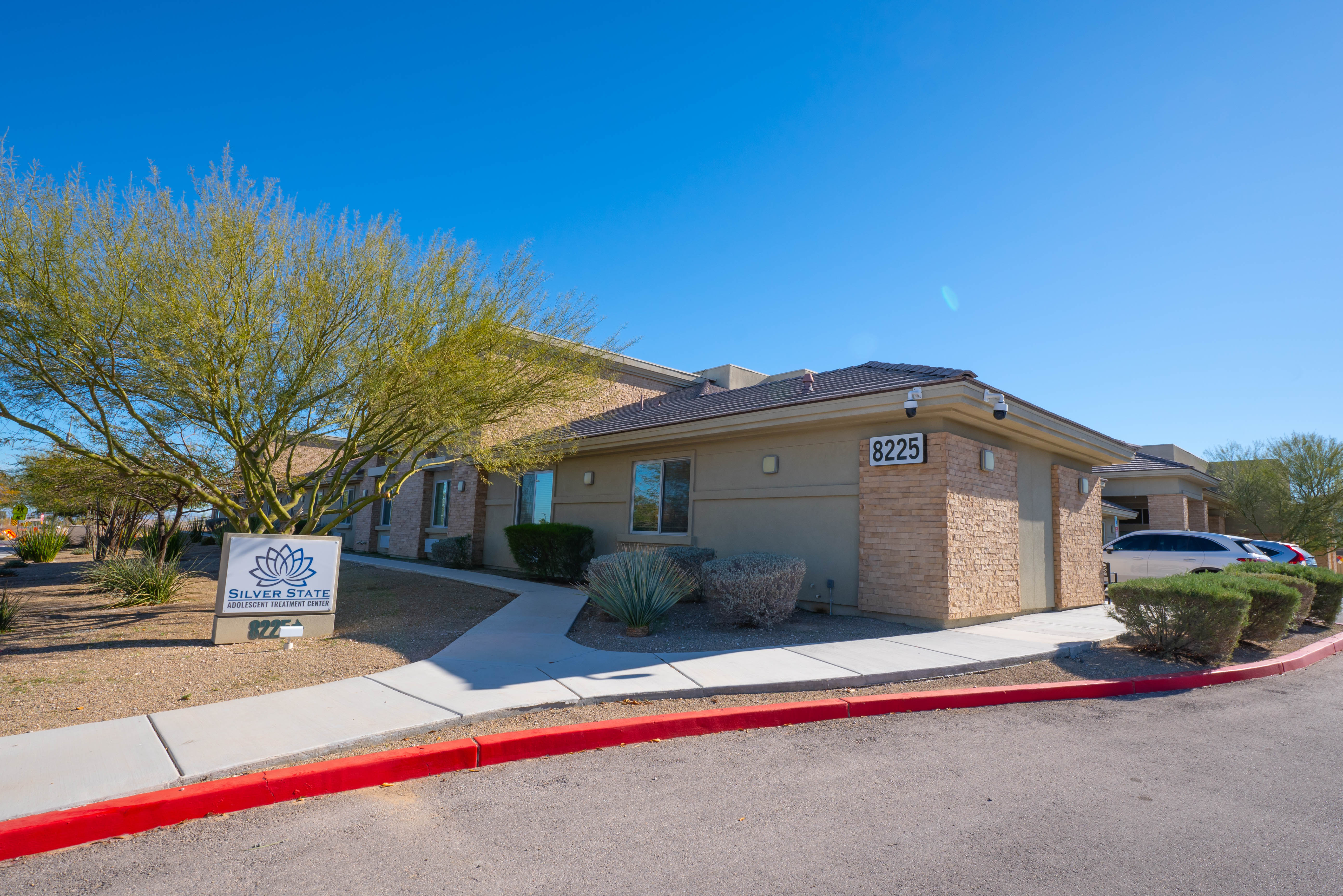 Silver State building corner with address 8225