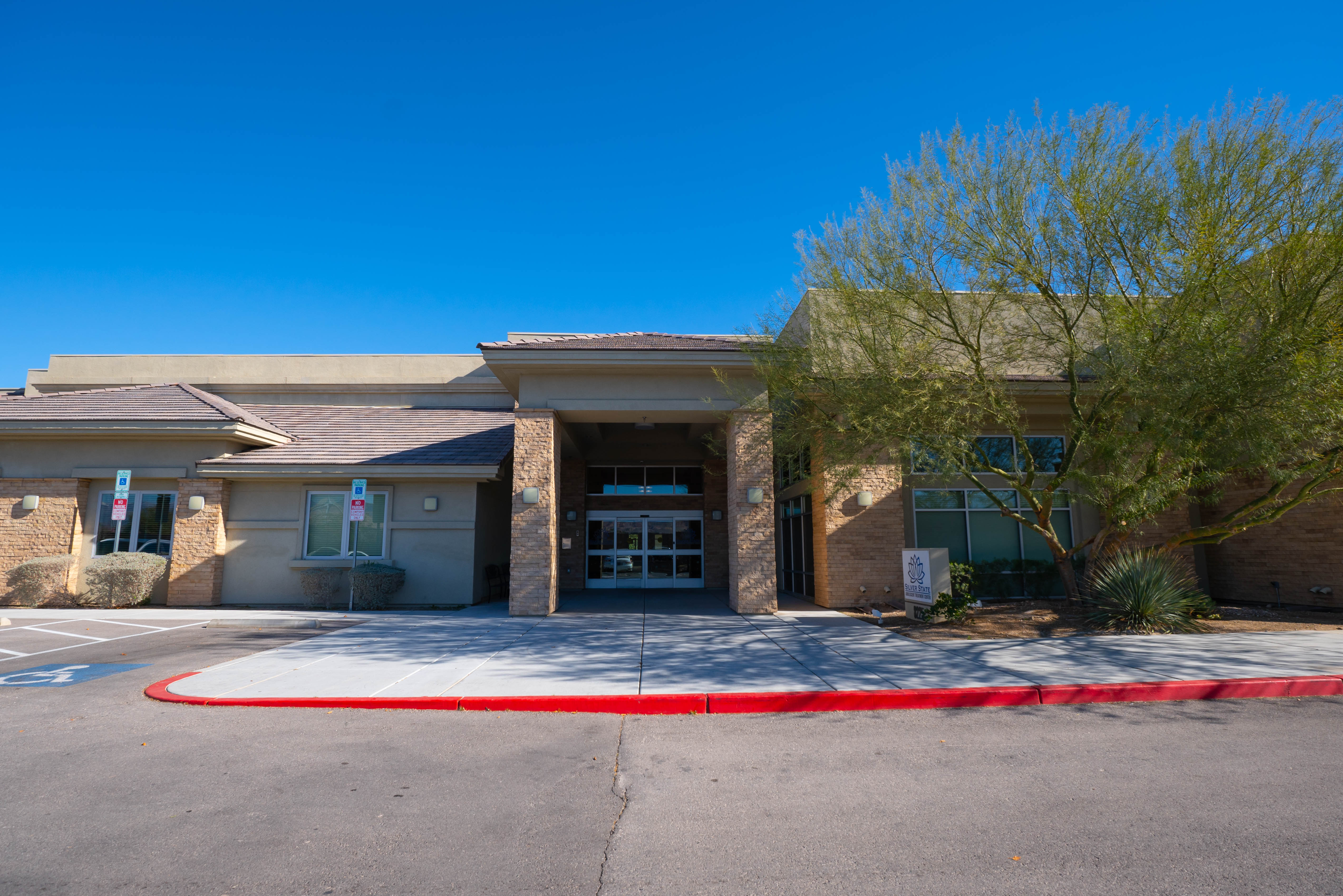 Silver State front entrance with covered portico