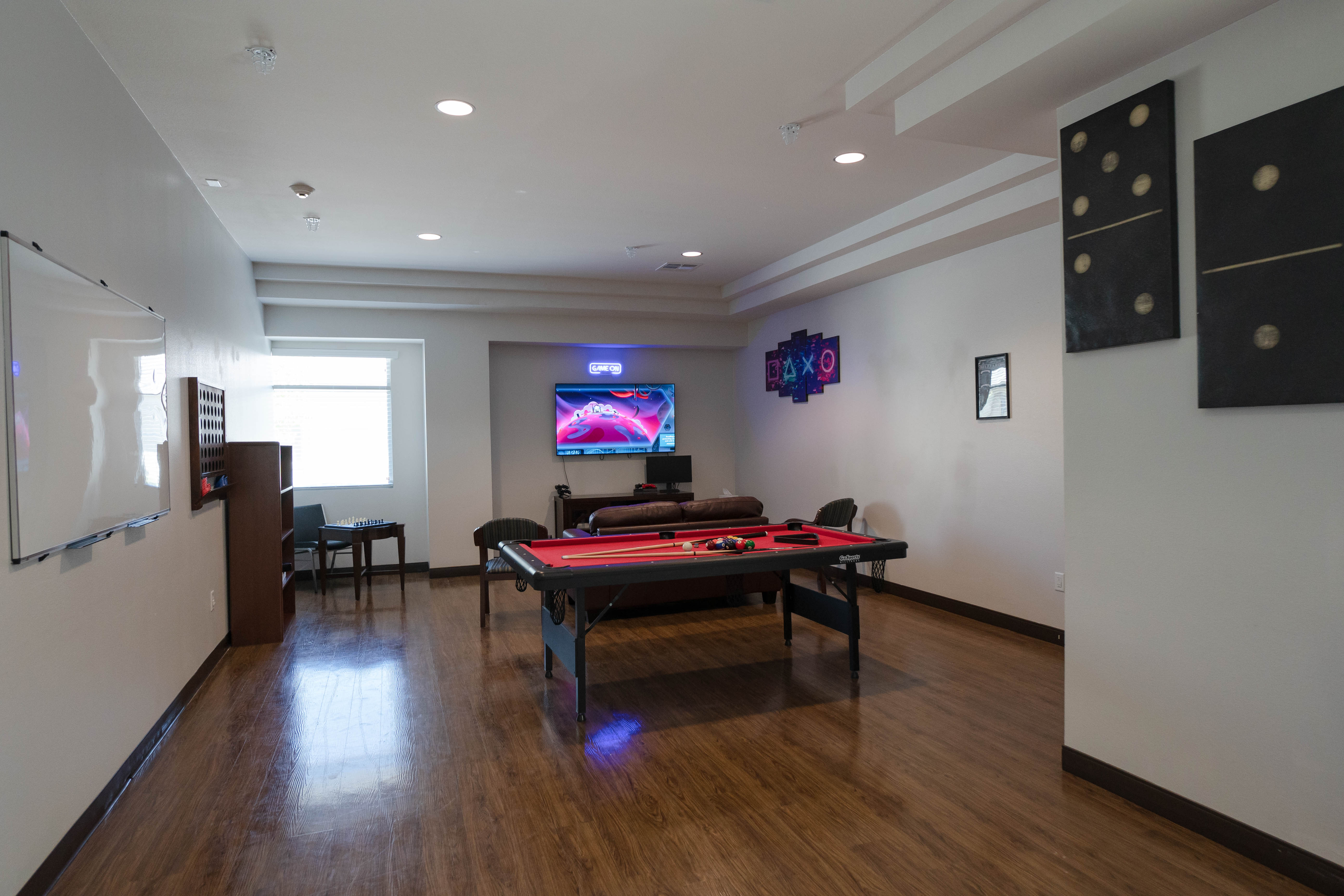 Silver State game room with pool table and activities