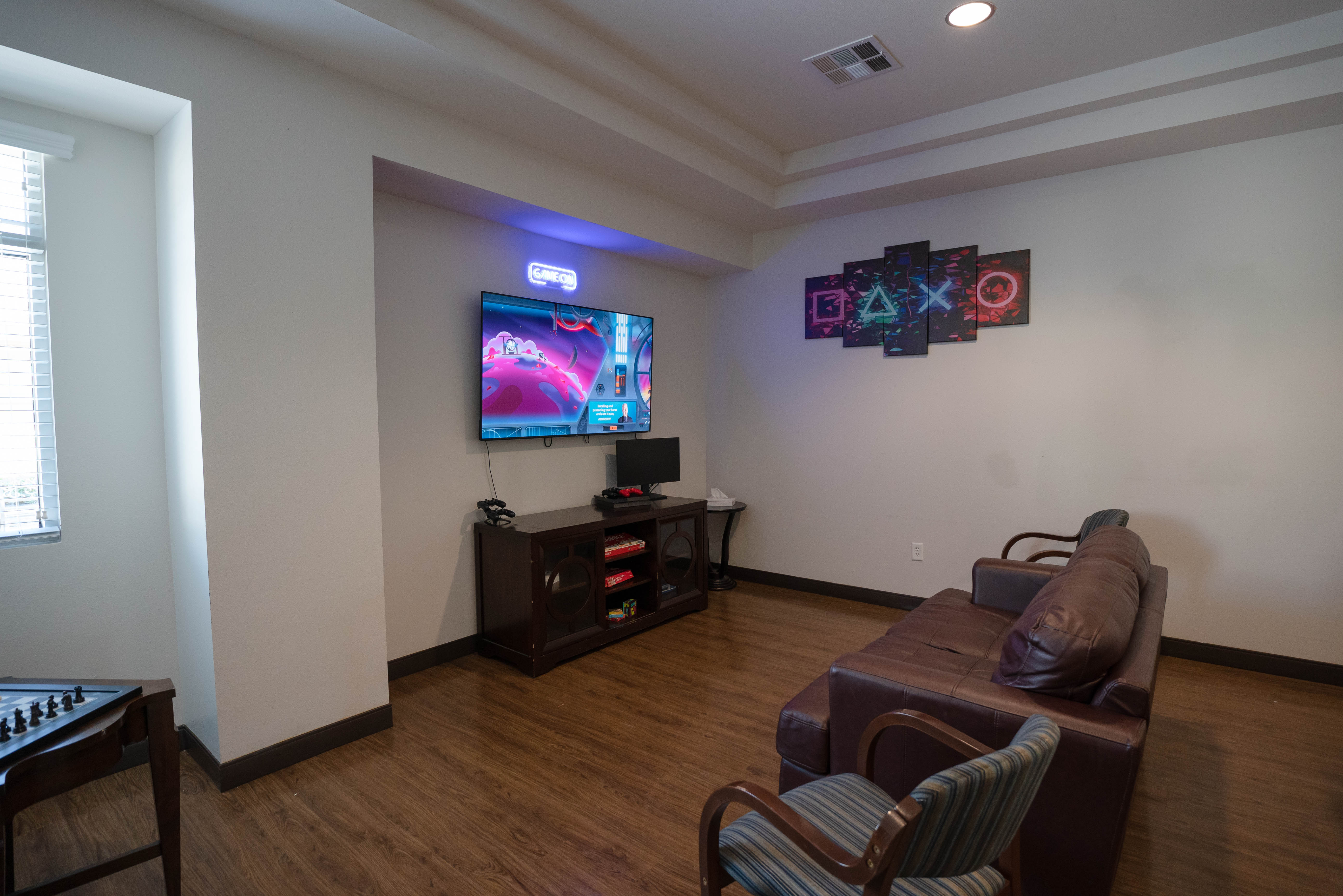 Silver State game room TV and console area